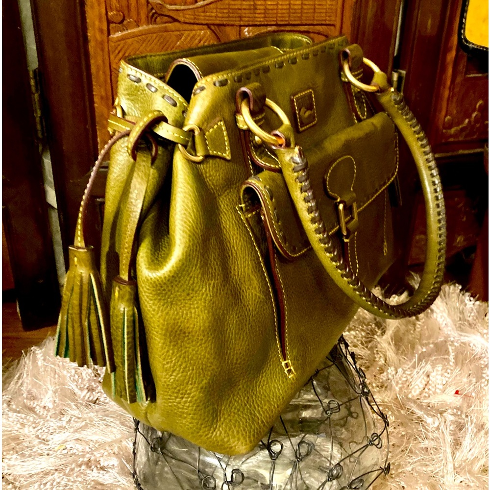 Dooney Bourke Brown Florentine Leather Front Pocket Tassel Adjustable bag.